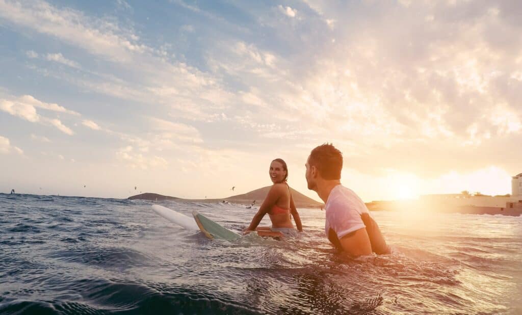 Couple Surfing Hawaii