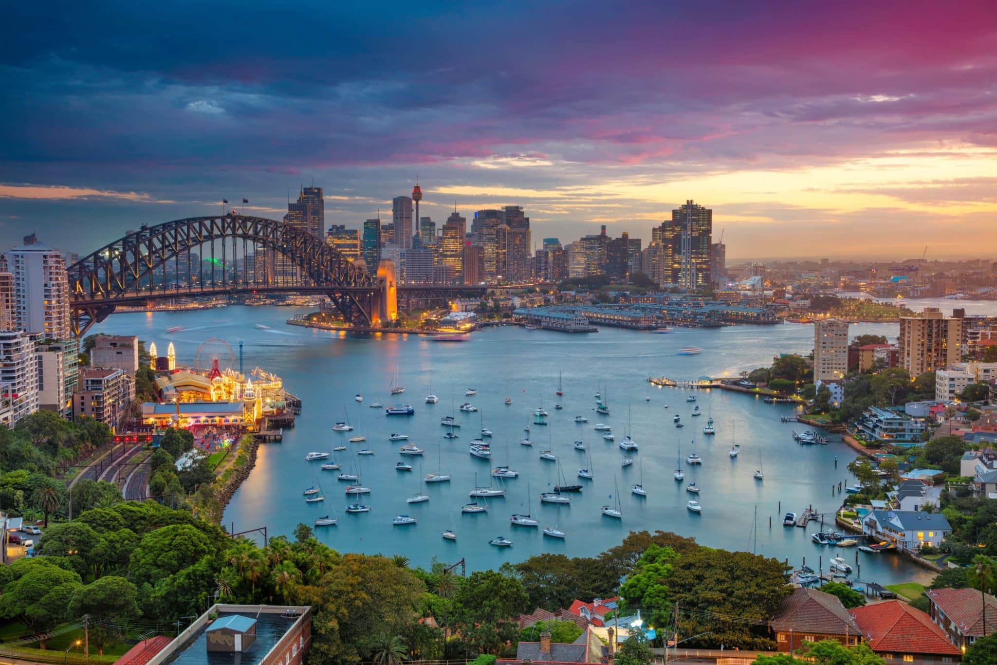 Overhead-or-drone-shot-of-Sydney-Australia-with-views-of-the-Sydney-Harbour-Bridge-over-the-ocean