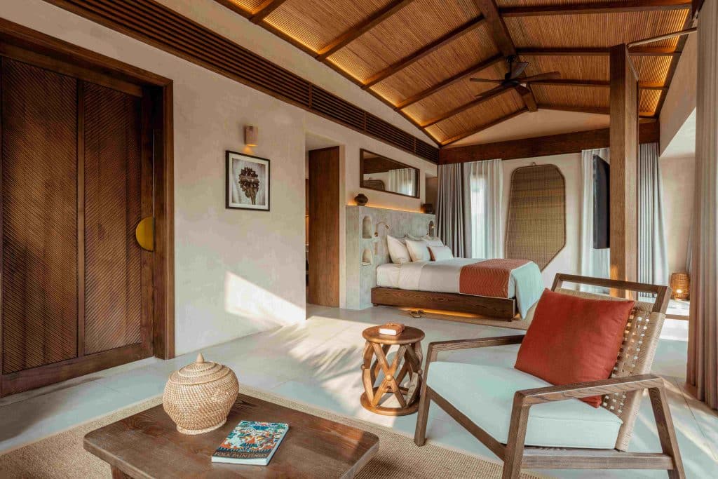 Inside a Nipa Villa Bedroom at the Namia River Retreat