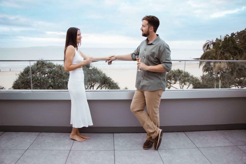 Couple on balcony Netanya Noosa