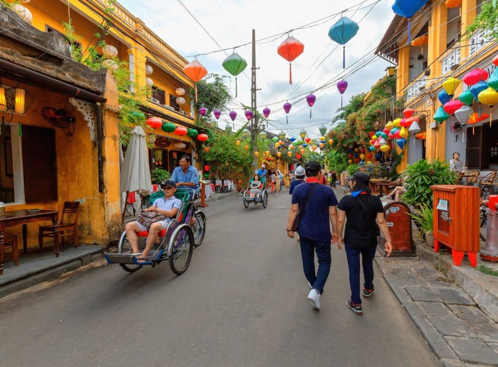 couple walking Hoi An - Vietnam