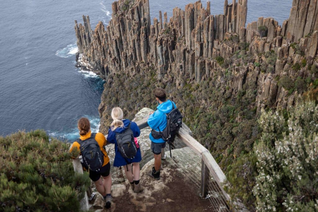 Tasmanian-Walking-Company-TWC-Three-Capes-Guided-Adventure-Walk-tourists at the peak of the mountain